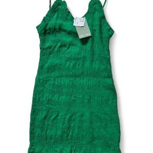 NWT H&M green mini dress with ruffle hem and adjustable straps. Size M